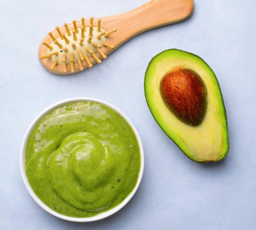 A DIY hair mask with avocado and coconut oil.