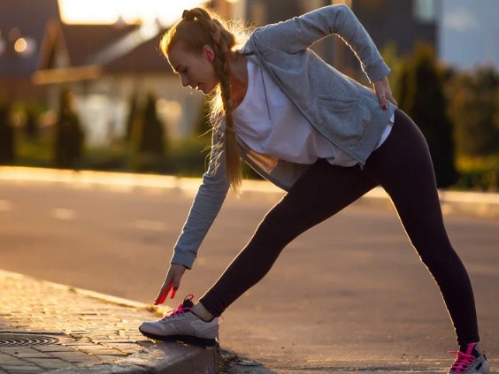 Morning rituals Exercise in a ground sunny day.